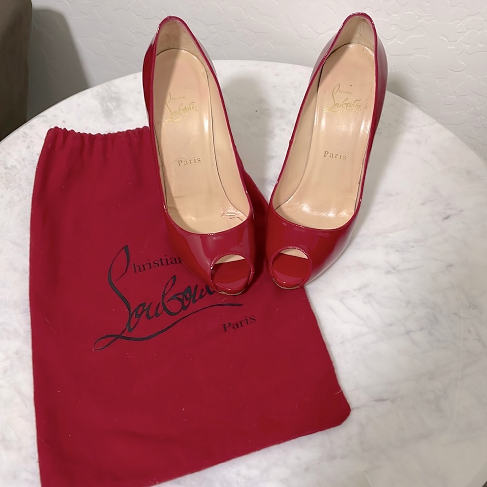 AUTHENTIC Christian Louboutin Red heels (good condition)